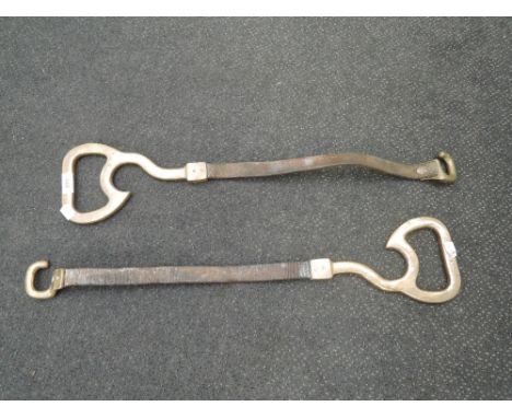 Two vintage brass and leather fireman's ladder and hose straps