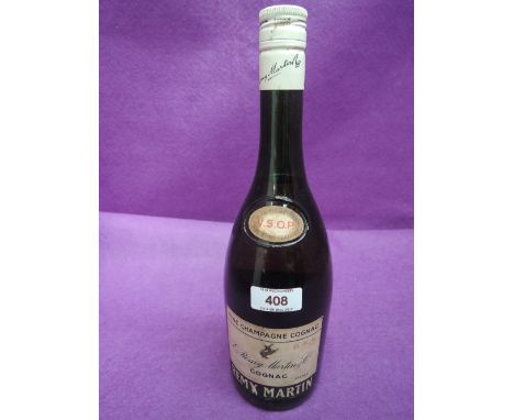 A bottle of V.S.O.P. Fine Champagne Cognac Remy Martin, no strength or capacity on label