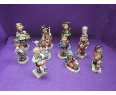 Eleven Hummel figures including Baker, Little Drummer, Home From Market, Good Friend etc, (some af)