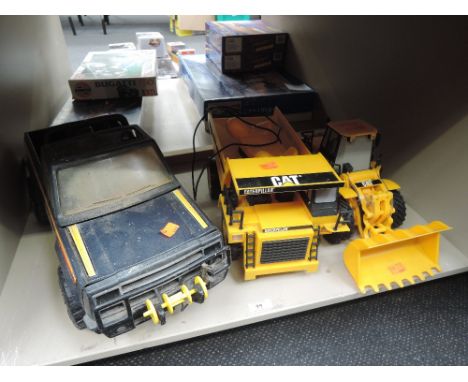 Three modern large scale plastic Tonka and CAT vehicles, Jeep, Dumper and Loading Shovel