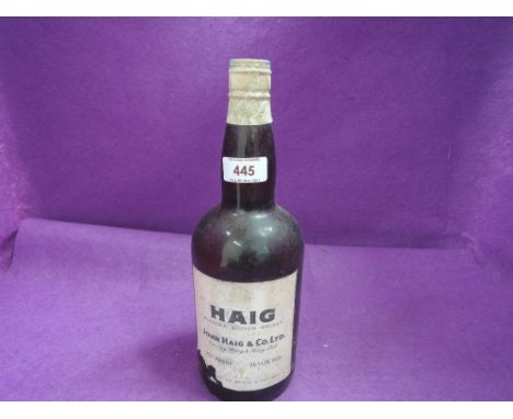 A bottle of Haig Blended Scotch Whisky, Gold Label, 70% proof, 26 2/3 fl ozs with spring cap top, good level