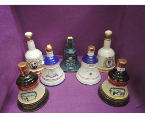 Seven ceramic decanters of Bells whisky including 20yr old reserve