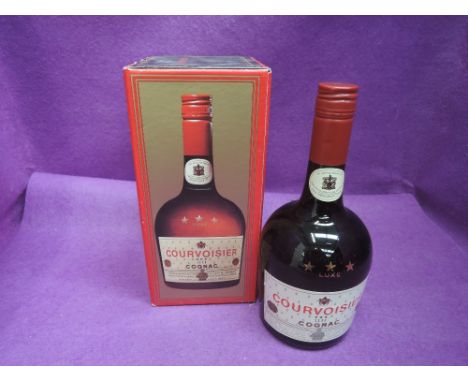 A bottle of 1950's Courvoisier Three Star Luxe Cognac,  Late George VI on label, in box