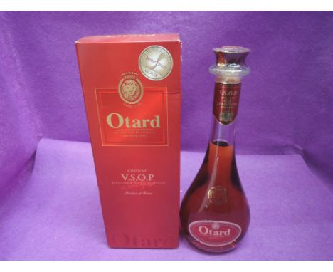 A bottle of Otard V.S.O.P. Cognac, in box