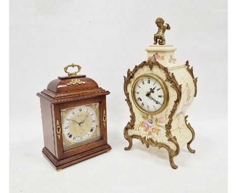 Mid-century mahogany-cased mantel clock by Elliot Clock Company, the circular dial with Roman numerals denoting hours, raised