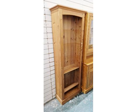 Contemporary pine bookshelf with one fitted shelf and four adjustable shelves, 198cm high x 66cm wide x 30cm deep&nbsp;