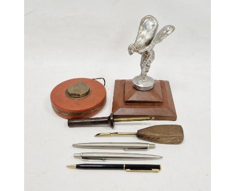 'Spirit of Ecstasy' car mascot mounted on a wooden base, two stainless steel Parker pen biros, two wood handled quill pens, a