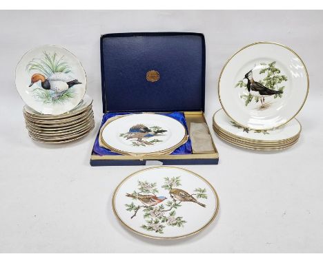 Set of twelve Crown Staffordshire 'Peter Scott Wildfowl' porcelain plates depicting various bird in relief, a set of eight Co