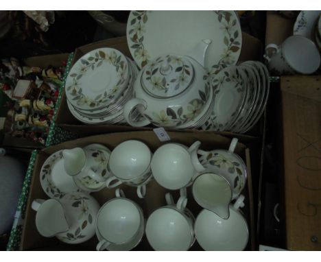 2 boxes containing tea service marked Wedgwood, Beconsfield, cups saucers, milk jugs, plates, teapot etc.