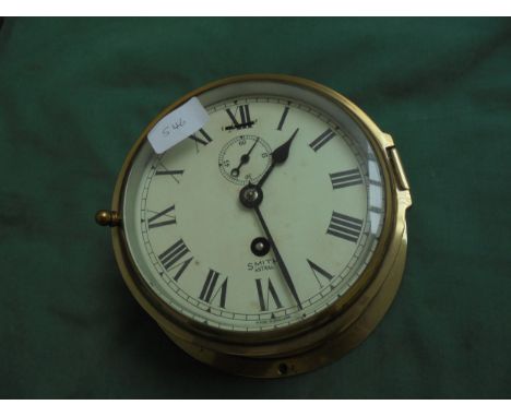 Bulk head clock in brass by Smith Astral