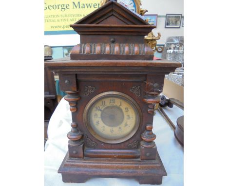 Old oak mantle clock, Roman Numeral Face by Fattorini & Sons of Bradford