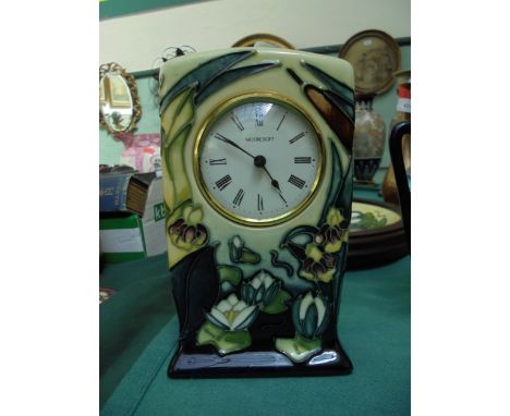 Moorcroft clock in traditional Moorcroft surround marked JK and additional signature 