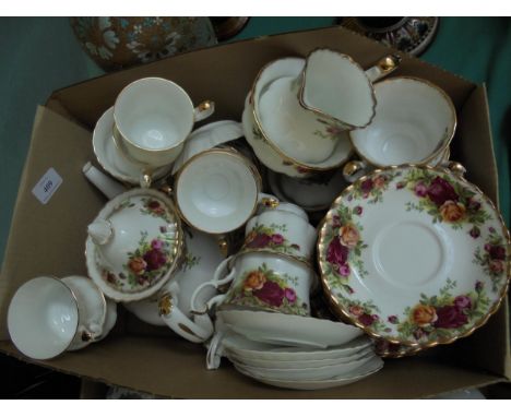 Large selection of Royal Albert tea service with rose pattern including tea pot stand, milk, sugar, tea cups and saucers toge