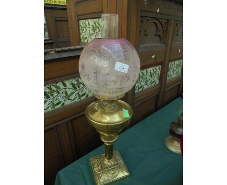 Original heavy brass oil lamp with pink decorative shade (complete)