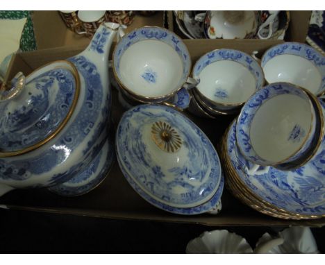 Early 19th century Spode blue and white tea service as follows; teapot scurrier, milk jug, 10 cups and saucers plus stand 