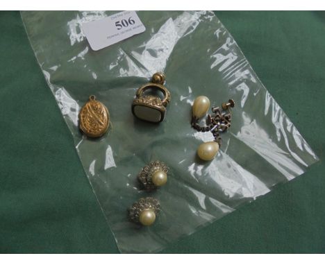 Gold style locket, pearl style earrings 