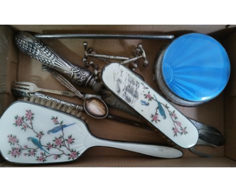 A tray of assorted hallmarked silver including enamel dressing table ware, knife rests etc.