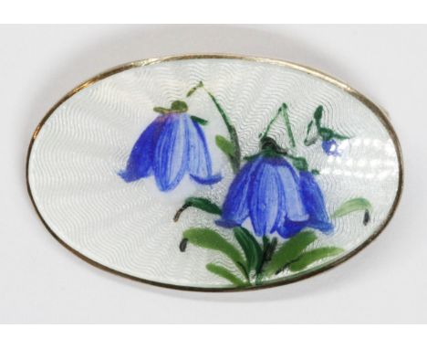 A David Andersen Norwegian silver gilt and enamel brooch decorated with blue bells, marked 'DAVID-ANDERSEN NORWAY STERLING 92