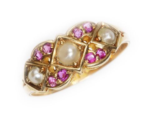 A Victorian split pearl and ruby ring, hallmarked 15ct gold, sponsor 'A.A', Birminggham 1870, gross weight 2.8g, size O.  Con