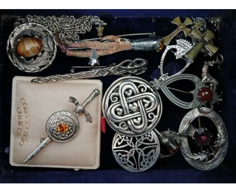 A jewellery box containing Scottish and Celtic jewellery including silver.  