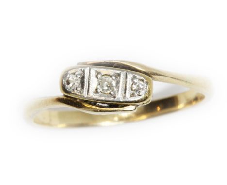 An Art Deco style three stone diamond ring, unmarked, gross weight 2.7g, size R.  Condition - good, minor wear only.