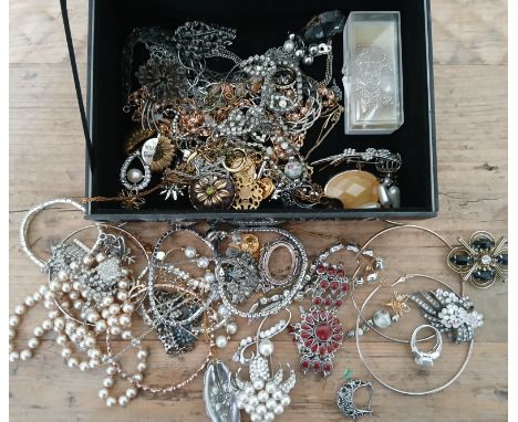 A veined black marble effect glass jewellery box containing vintage and costume jewellery.  