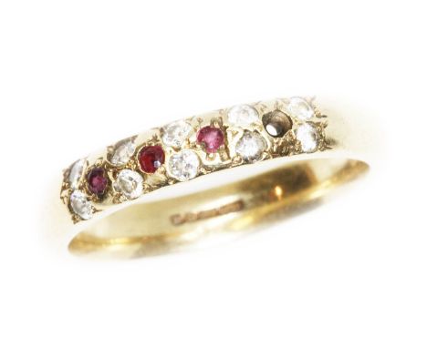 A hallmarked 9ct gold ruby, diamond and other colourless stone ring, gross weight 4.8g, size T.  Condition - one stone missin