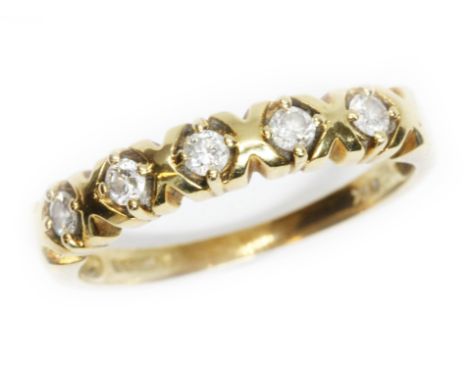 An 18ct yellow gold five stone diamond ring, total approximate diamond weight 0.20cts, hallmarked; sponsor 'S&amp;K', London 