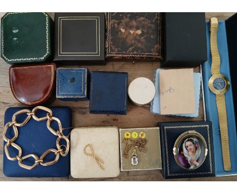 Assorted jewellery boxes and a small quantity of jewellery including yellow metal, a porcelain brooch, a gold plated Rotary w