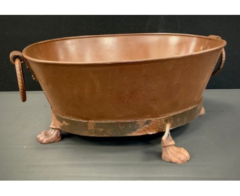 An oval metal iron ring handled oval bath tub planter, 50cm long 