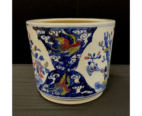 A contemporary Chinese porcelain planter decorated with exotic birds, 29cm high 