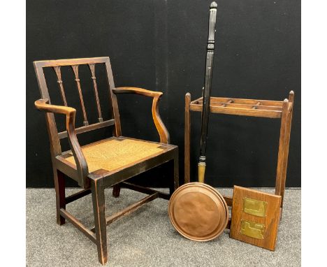 A 19th century elm, rush-seated armchair, 83cm high x 59cm wide x 43cm deep;  an early 20th century oak stick stand;  etc, (4