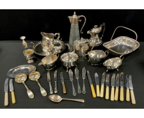 An Art Deco silver plated circular dish, tripod scrolling handles and feet, swing handle basket, part tera set,  flatware etc