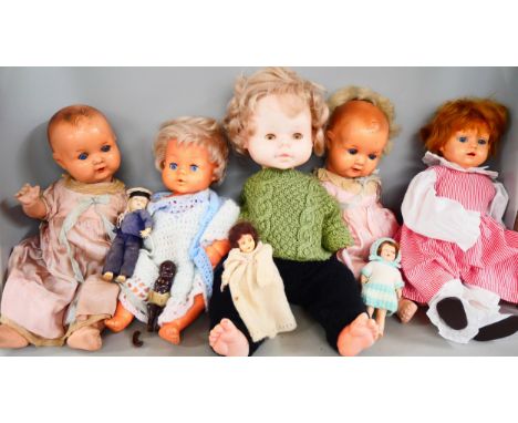 A collection of eight dolls including two Armand Marseille, both AM 518/3’/2K, a/f