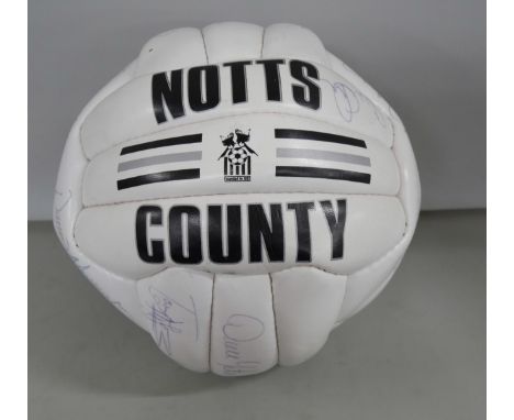 An early 1990s signed Notts County football to include Paul Devlin, Richard Walker, Paul Cox, and other team members (23 sign