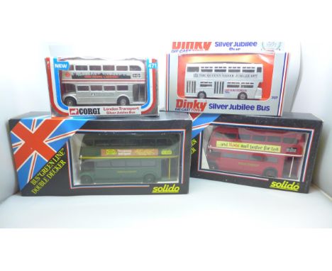 Four model buses, two Solido, Dinky Toys and Corgi, all boxed