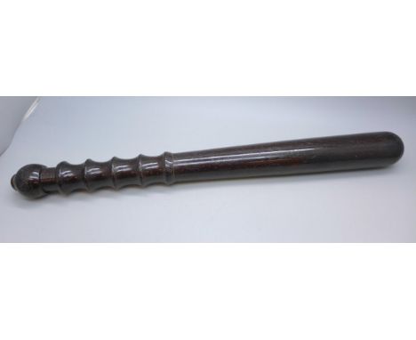 An early to mid 20th century truncheon, numbered 84