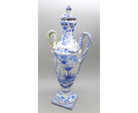 A small hand painted Delftware greek style vase with associated lid, base signed AK possibly for Adrianus Kocx, a/f, 22cm