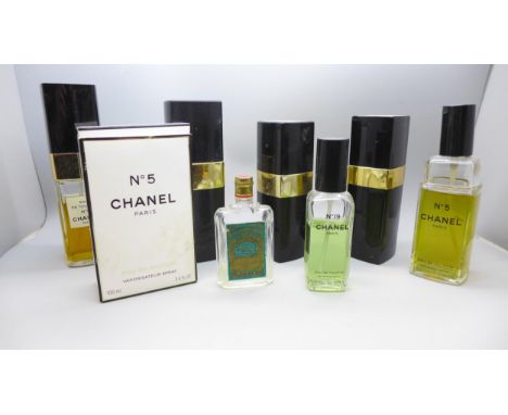 A collection of Chanel perfumes, Chanel N°5, five bottles, Chanel N° 19, and a small 4711, mainly part contents