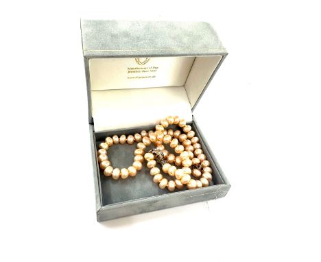 9ct gold Salmon pink pearl earrings with a silver clasp pink salmon pearl necklace