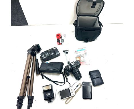 Selection of camera and camera equipment includes digial cameras, minolta, tripod stand, toshiba etc 