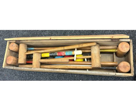 Wooden cased Croquet garden game, has sustained woodworm, case measurements: Length 42 inches, Height 9 inches, Width 11.5 in