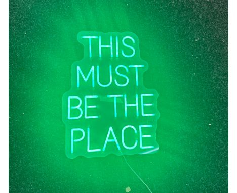Neon beach light up "this must be the place" green neon light, complete working order measures approximately 20 inches by 15 