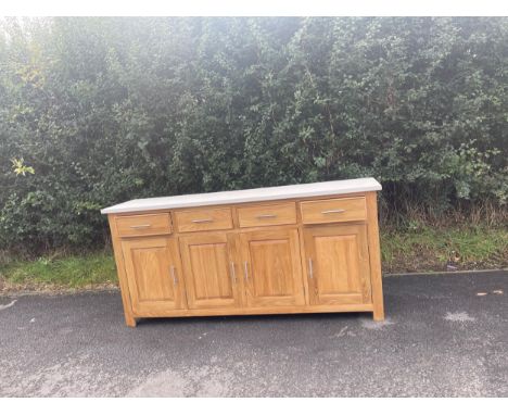 Modern light oak 4 door 4 drawer sideboard measures approximately 35.5 inches tall 75 inches wide 19 inches depth