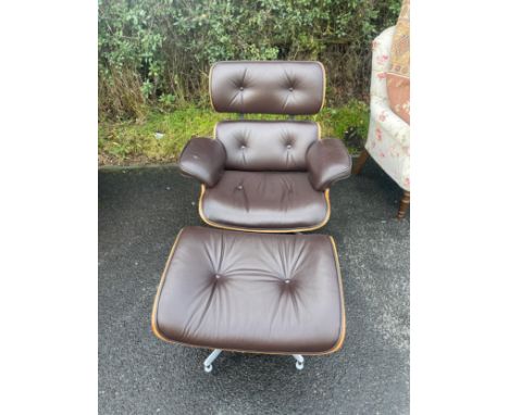 Eames replica lounge chair and footstool, one button missing and one loose 