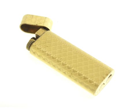 A CARTIER lighter with engine turned design, marked Cartier Paris 744161, working