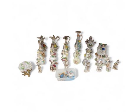 A group of English porcelain flower encrusted scent bottles and yours, Coalport, Minton etc., c.1830-50 together with Contine