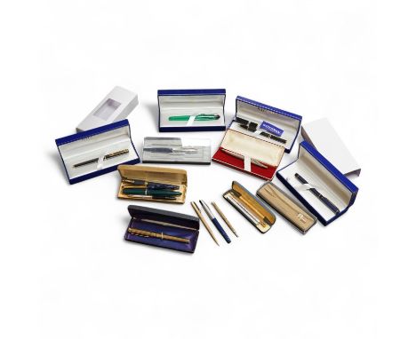 Four assorted cased Waterman pens, elven other assorted pens including Scheaffer and Parker and an engine turned silver pen.