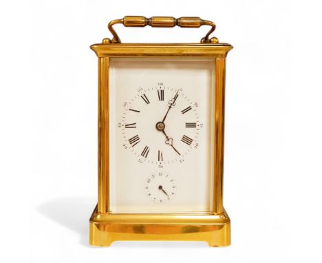 A French carriage clock with alarm, gong-striking movement, in a contemporary leather case, 17cm high