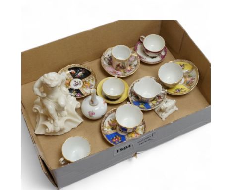 A group of 19th/20th century German porcelain, comprising a Nymphenburg pug, seven Dresden miniature cups and saucers and a M